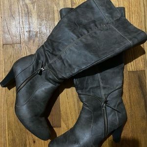 Knee high gray heeled boots